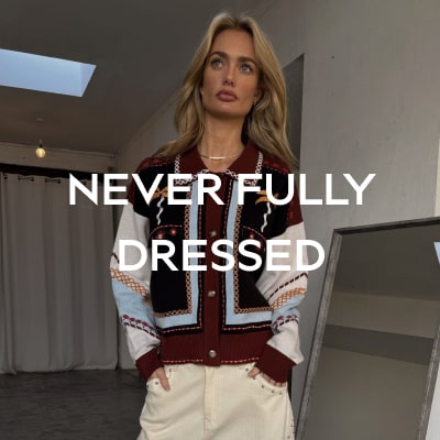 NEVER FULLY DRESSED
