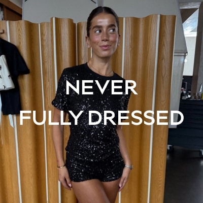 NEVER FULLY DRESSED